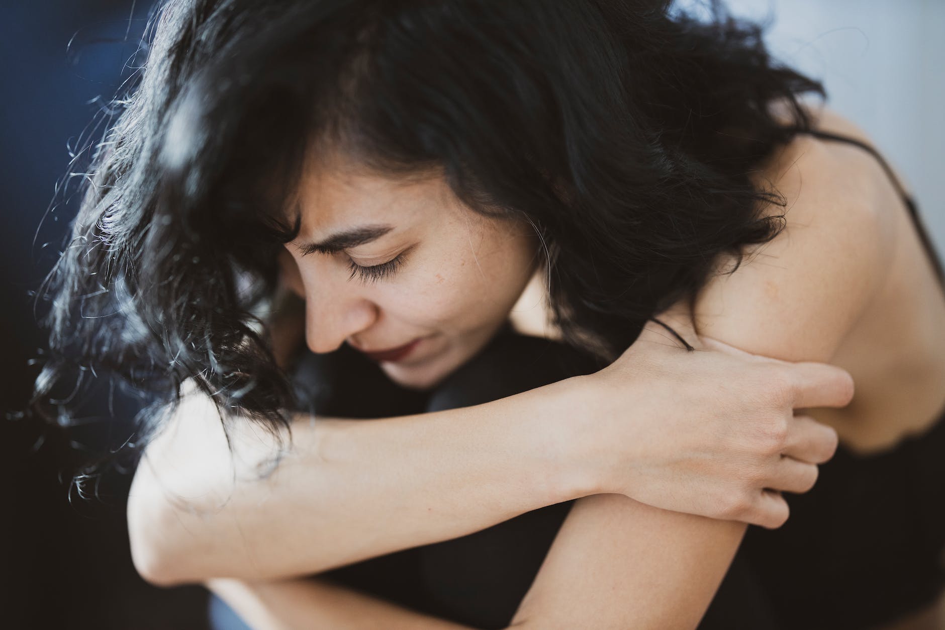 woman wearing black camisole